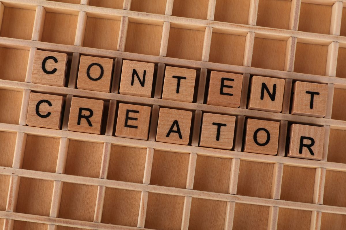 Content creator planning short-form video content at a desk