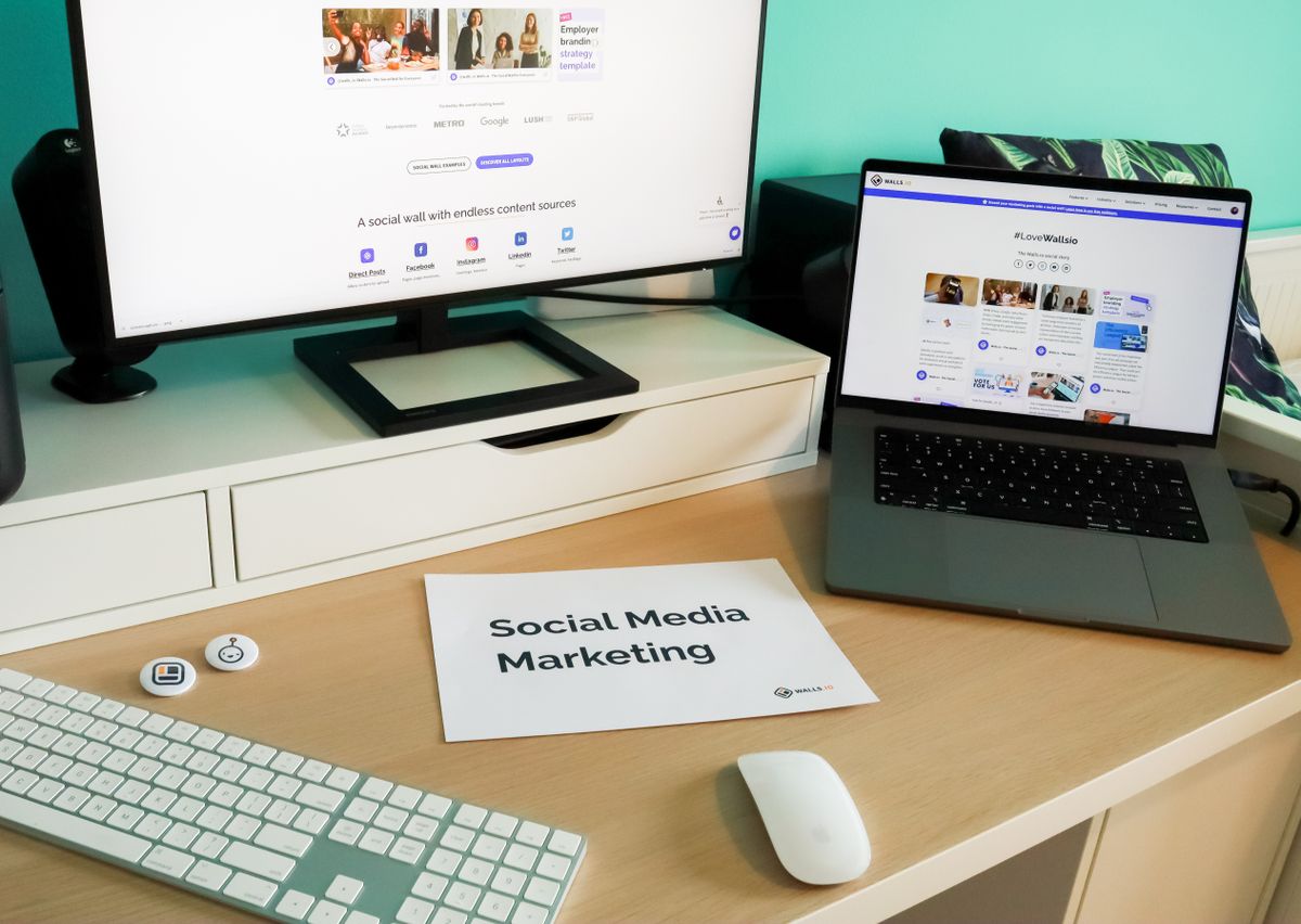 Social media manager planning posts on a laptop